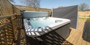 lodge with a hot tub